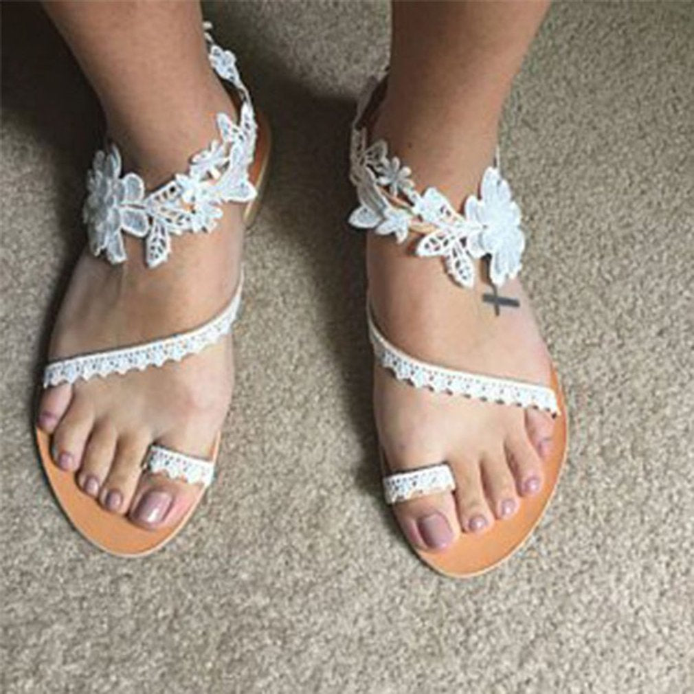 Harshada | Chaussons en dentelle avec motif floral